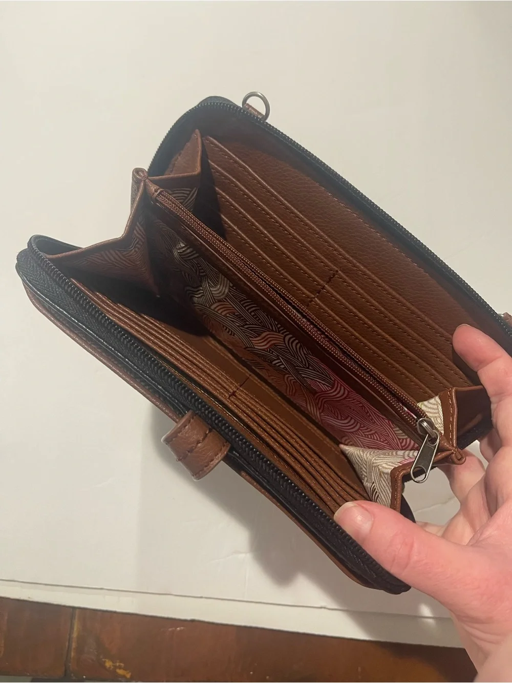 The Sak Black and Brown Leather Zip Wallet READ